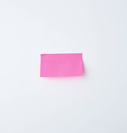 pink rectangular sticker on a white background, place for textの写真素材