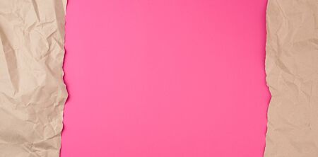 Retro brown paper torn, great design for any purposes. Abstract texture. Pink banner, copy space.の写真素材