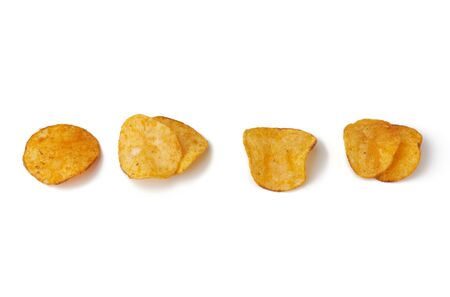 various potato chips with spice isolated on a white background, top viewの写真素材