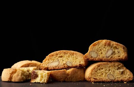 baked piece Italian almond biscotti, cantuccini cookies, traditional italian Christmas, New Year dry cookies. baking isolated on white backgroundの写真素材