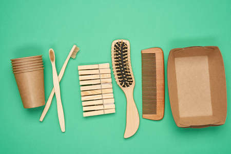 various household items from recyclable raw materials on a green background, top view, zero wasteの写真素材