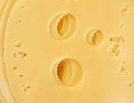 slice of edam cheese, texture, full frame, close upの写真素材