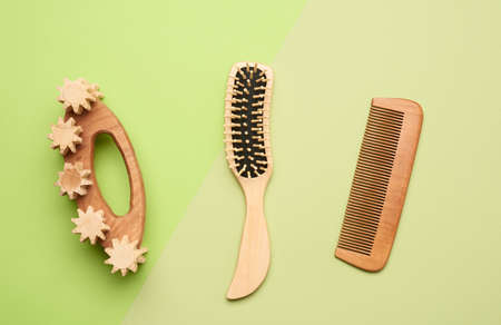 various household items from recyclable materials on a green background, top view, zero waste