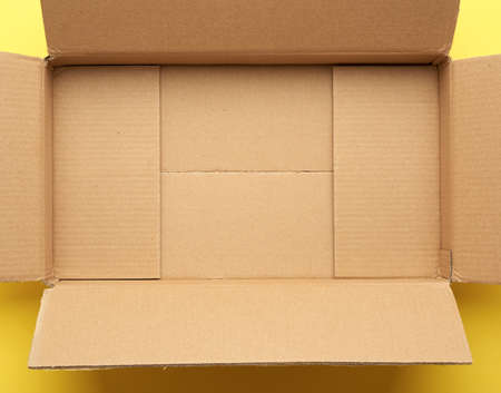 empty open cardboard brown box, bottom, top viewの写真素材