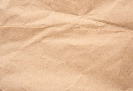 empty sheet of brown wrapping kraft paper, vintage texture for the designer, full frameの写真素材