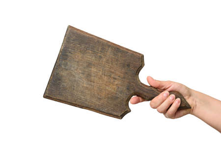 woman holding blank brown rectangular wooden board in hand, body part isolated on white background
