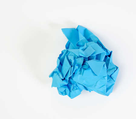 crumpled ball of blue paper on white background, element for designer