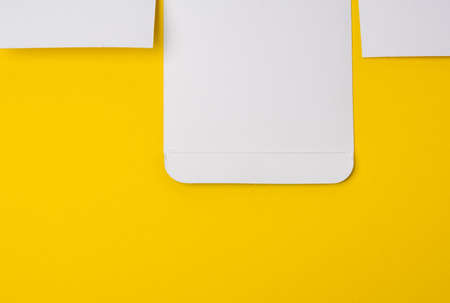 texture of yellow paper, cardboard for designer, full frameの写真素材