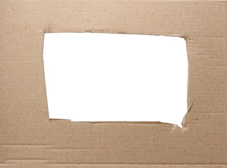 brown corrugated paper texture with square hole, white background, close up