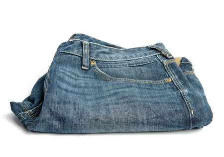 folded blue men's jeans on a white background, top viewの写真素材