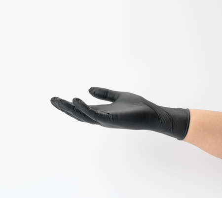 female hand in a black latex glove on a white background, palm openの写真素材