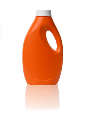 orange plastic bottle for liquid laundry detergent isolated on white background, close upの写真素材