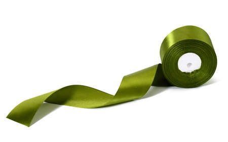 roll of silk green ribbon, wrapping decor, white isolated backgroundの写真素材