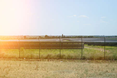 solar panels in the middle of a field on a sunny day, Ukraineの写真素材