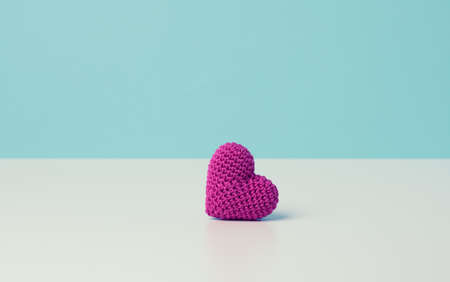 one red heart on a blue background, copy space, Valentine's Day