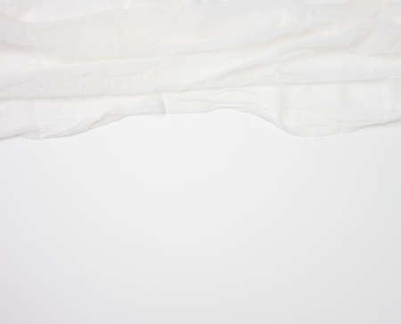 piece of white gauze on the table, top view, copy spaceの写真素材