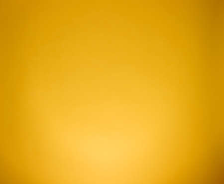 yellow abstract paper background with gradientの写真素材