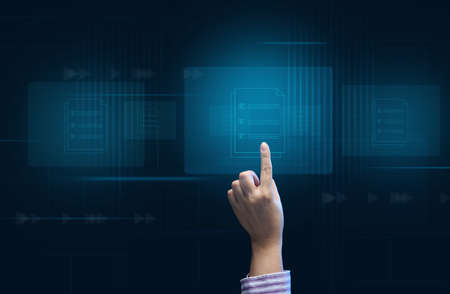 a female hand checks documents on a holographic screen. The concept of compliance control, documents...