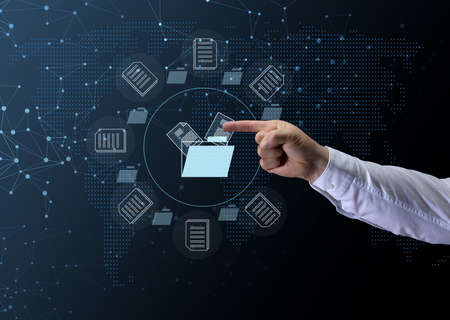 concept of document flow in the company, the transition to paperless technology. Electronic document management, reduction of bureaucracyの写真素材
