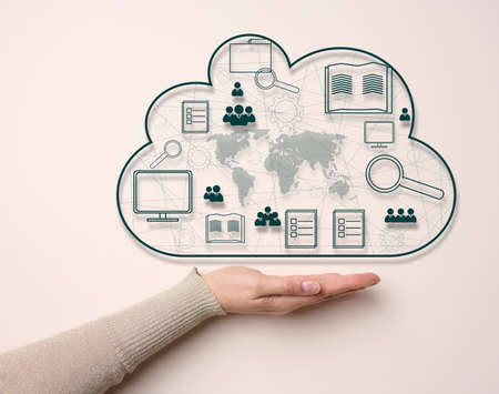 Woman's hand on a beige background. Cloud data storage, information exchange and secure data...