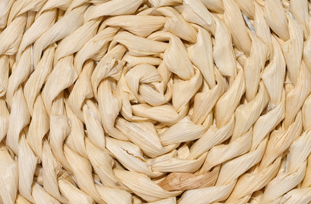 Texture of knitted yellow straw rug