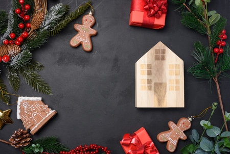 Christmas decor, gift red boxes on a black background, top view. Place for descriptionの写真素材