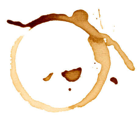 Imprint of spilled black coffee on a white isolated backgroundの写真素材