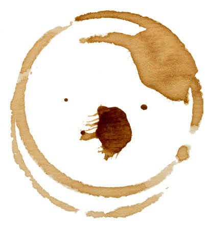 Round imprint of spilled black coffee on a white isolated backgroundの写真素材