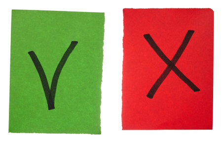 Red and green cards with a check mark and a cross, marking correctly and notの写真素材