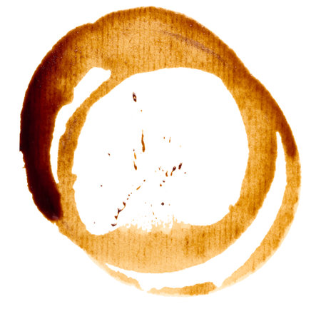 Round imprint of spilled black coffee on a white isolated backgroundの写真素材