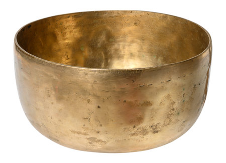 Empty copper singing bowl on isolated background, religious item for meditation and relaxationの写真素材
