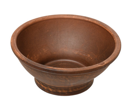 Empty brown clay bowl on isolated background, food plateの写真素材