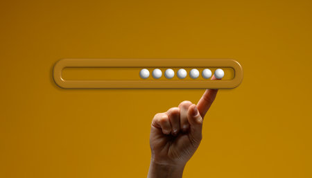 Human hand balancing horizontal loading scale with six white balls inside on index finger. Yellow...