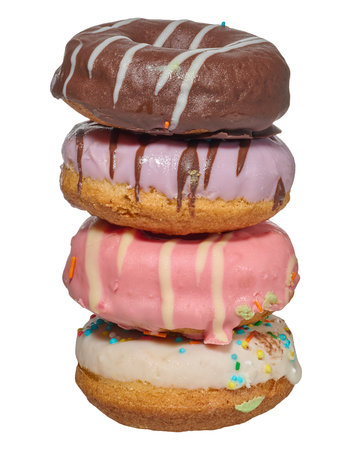 Stack of four colorful glazed donuts with assorted sprinkles and toppings, isolated backgroundの写真素材
