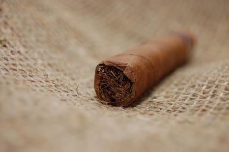 Cuban cigar on hessian canvasの写真素材