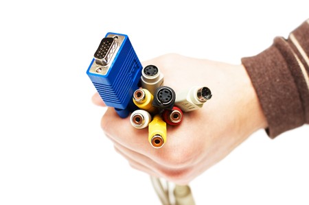 Coloired computer cables on man hand