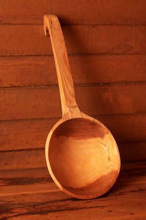 Wooden spoon in steam room. Russian baths.の写真素材