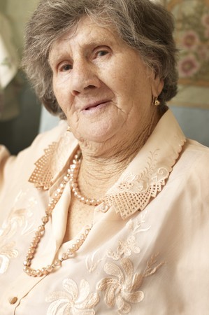 Smiling woman in age of 85 yearsの写真素材