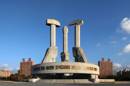 PYONGYANG, North Korea - 2012 NOVEMBER: Monument to the Founding of the Korean Workers' Party. This consists of a Hammer, a Sickle, and Writing Brush. 50 metres high. It was built to mark the 50th anniversary of the founding of the ruling Korean Workers Pのeditorial素材