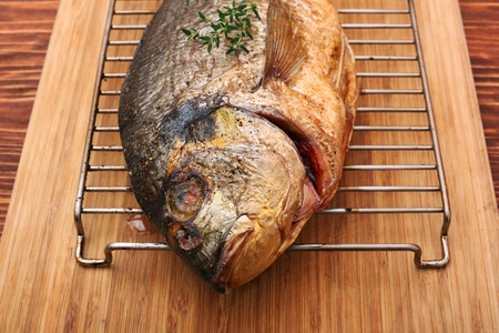 Whole fried dorado fish
