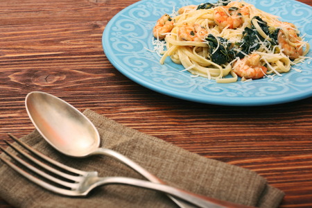 pasta with shrimps, spinach and parmesanの写真素材