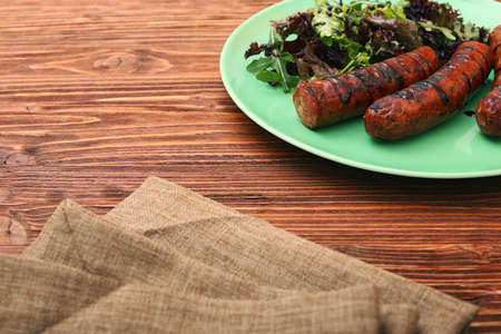 Grilled sausages with greensの写真素材