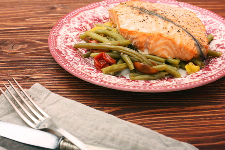 Salmon steak, veggies and herbs. Healthy eating conceptの写真素材