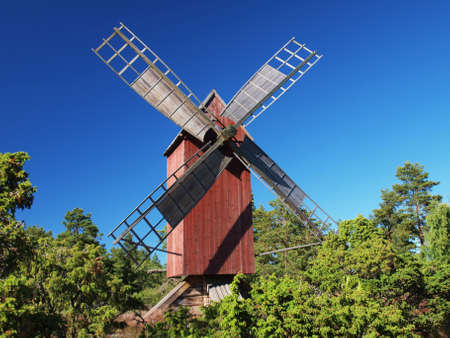 Traditional red windmillの写真素材