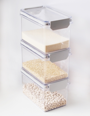 Three different groceries in square transparent containersの写真素材