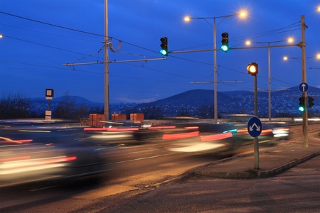 Fast moving cars at night