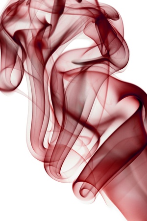 Red smoke in white backgroundの写真素材