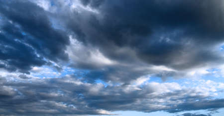dramatic dark sky with clouds and light 