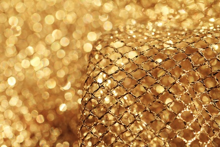 Lustrous elegant golden fabric - macroの写真素材