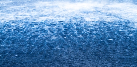 Raging sea with furious waves and fierce windの写真素材